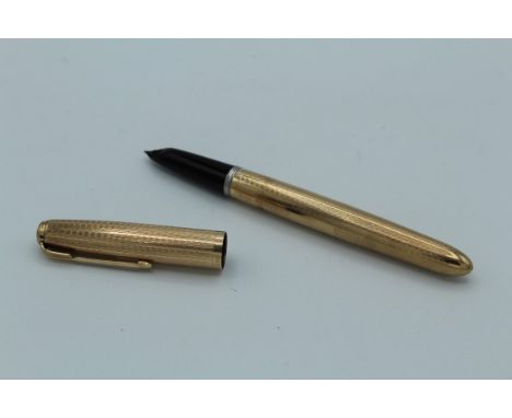 A 9ct gold Parker 51 Presidential fountain pen. Hallmarks for London, 1957/1958, 14cm