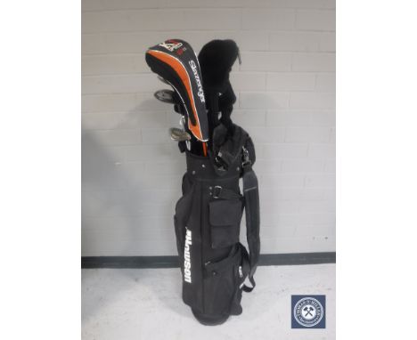 A Howson golf bag containing assorted drivers and Howson irons