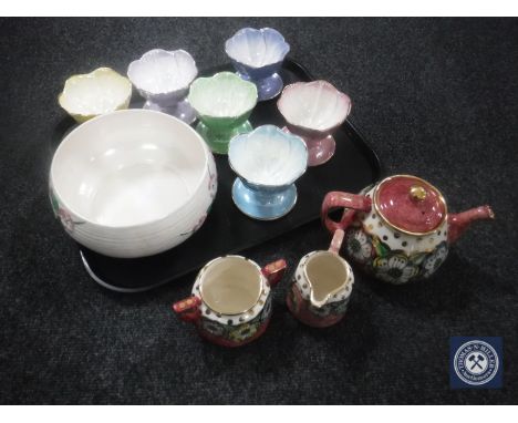 A tray of Maling bowl, six Maling lustre grapefruit dishes and a three piece Price Brothers teapot, sugar basin and milk jug 