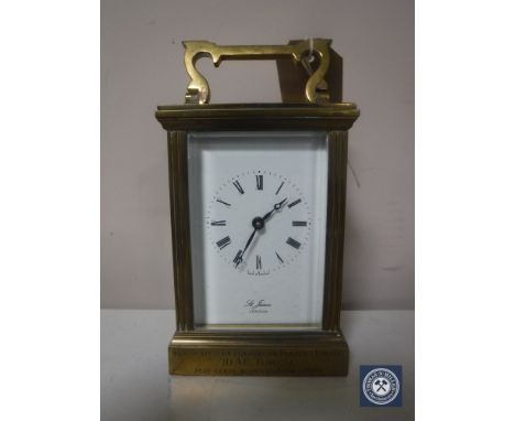 A brass carriage clock signed St. James, London
