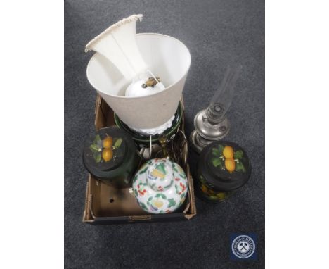 A box of wooden storage jars, chrome oil lamp with chimney etc.