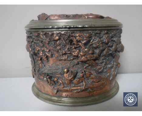 An early 20th century plated and copper embossed caddy with liner 
