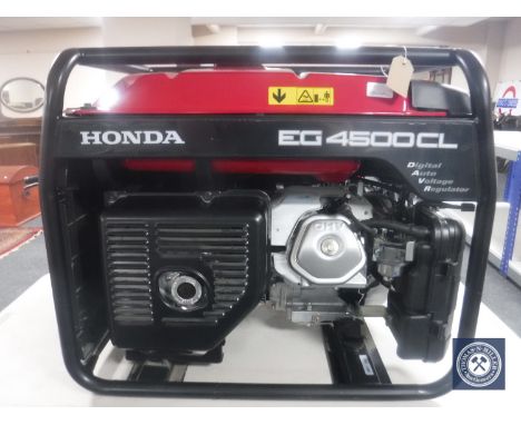 A Honda EG4500 CL generator with digital auto voltage regulator, with owner's manual CONDITION REPORT: Little or no signs of 
