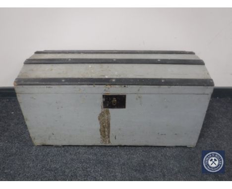 An early 20th century painted pine domed topped trunk 