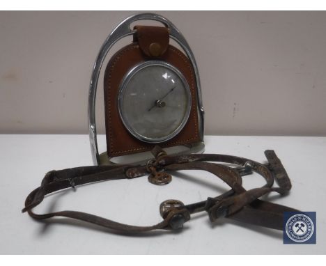 An early twentieth century 'stirrup' barometer and two small stirrups