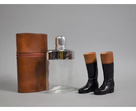 A Mid 20th Century Leather Covered Glass Hip Flask with Pair of Glazed Terracotta Riding Boots, 11cms High 