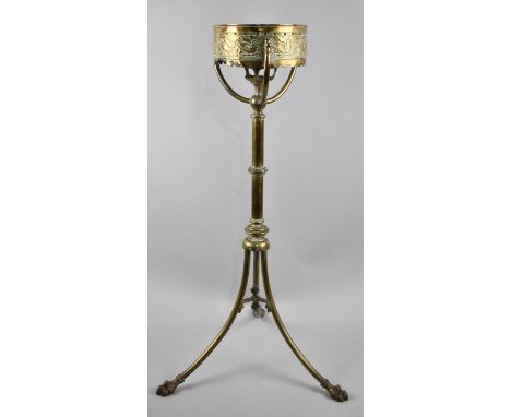 A 19th Century Brass Oil Lamp or Candle Stand with Turned Support and Splayed Tripod Legs Culminating in Claw Feet, 68cm high