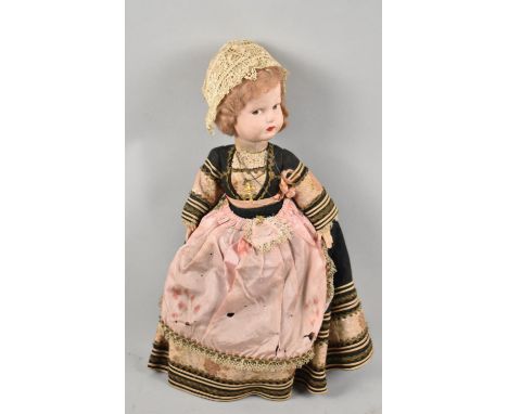 A Vintage Bisque Head Doll in National Costume, 42cm high 