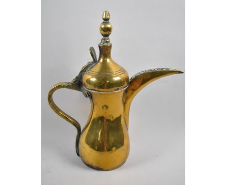 A Vintage North African Brass Coffee Pot with Stamp to Body, 29cms High 