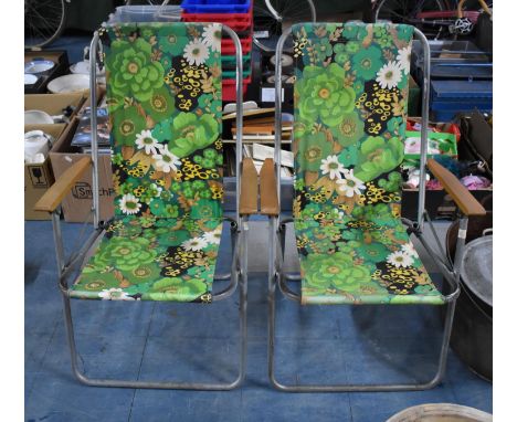 A Pair of Vintage Folding Patio Chairs with Teak Armrests and Vintage Green Floral Pattern Fabric 