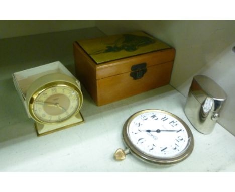 A Mauchlineware birch trinket box, the hinged lid decorated with foliage  4''w; a Cowey nickle plated cased traveller's timep