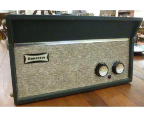 A 1960s Dansette portable record player, in a grey fabric covered case       LSM