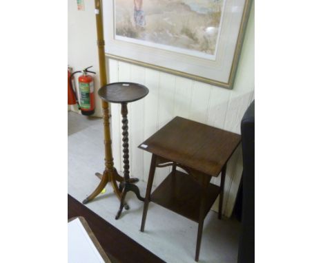 Small furniture, viz. a 1920s dark stained oak torchere, the barleytwist column raised on a cabriole tripod base  36''h; a mo