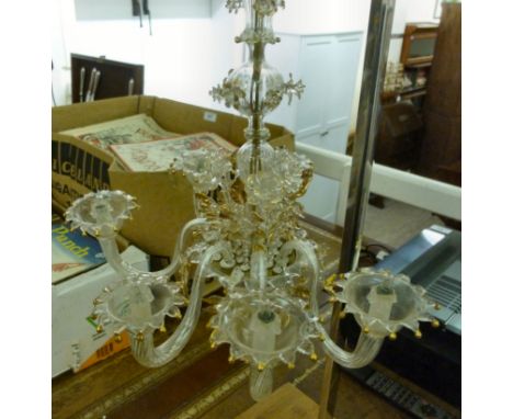 A Murano clear glass miniature chandelier with gilded highlights, the central, knopped stem embellished with flora, supportin