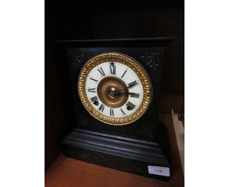 BLACK SLATE MANTEL CLOCK WITH AMERICAN MOVEMENT.