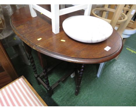 OAK OVAL DROP LEAF GATE LEGGED TABLE.