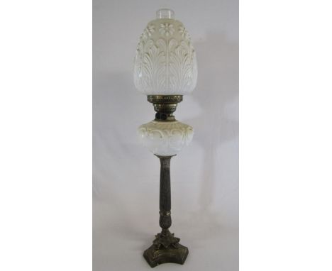 Duplex oil lamp with white glass reservoir and shade heavily tarnished silver plate stem and brass top- approx. 78cm to top o