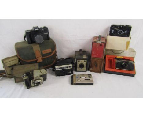 Collection of cameras includes Minolta, Brownie 44A, Instamatic, Ambassador, Mintax, Clip Sonic etc