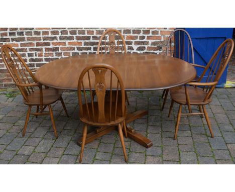 Ercol table with 2 swan back carvers and matching chairs and darker wood Quaker chair&nbsp;