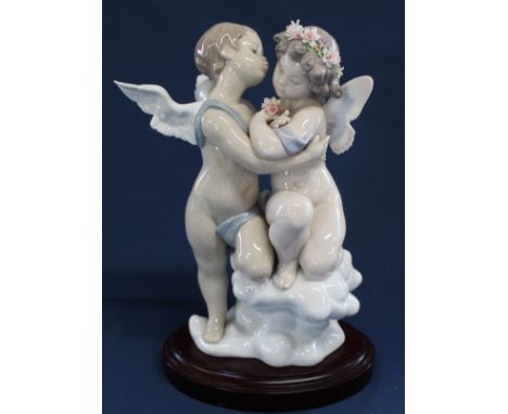 Lladro figurine "Heaven &amp; Earth"&nbsp; with wooden plinth, No. 1824, signed to base, boxed, 29.5cm x 21cm