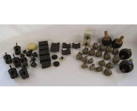 Collection of ceramic insulators, MEM DIX fuse boxes, vintage light switches and plugs and a collection of castors includes m