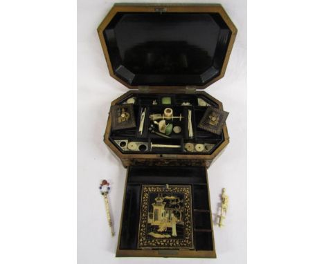 Chinese Export lacquered sewing box of typical canted shape, containing ivory and mostly bone sewing accessories and fitted i