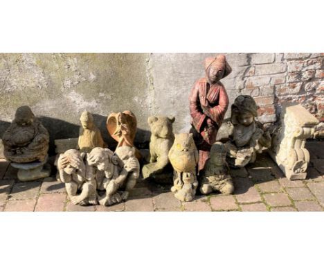 Collection of garden ornaments including Buddha, 3 wise monkeys, etc &amp; a bench support
