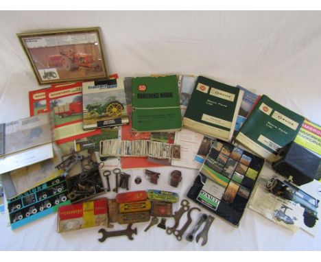 Collection of tractor manuals, tin of keys, Dunlop and Romac puncture repair tins (some with contents) Intrepid De Luxe fixed