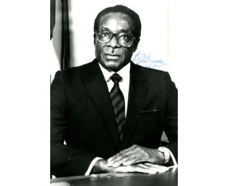 MUGABE ROBERT: (1924-2019) Zimbabwean Prime Minister 1980-87 and President of Zimbabwe 1987-2017. Signed 4.5 x 6.5 photograph