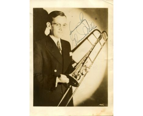 MILLER GLENN: (1904-1944) American big band trombonist and bandleader. Vintage signed sepia 5 x 7 photograph of Miller standi