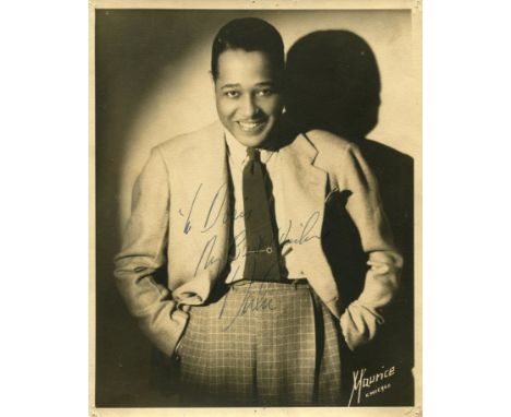 ELLINGTON DUKE: (1899-1974) American jazz composer and pianist. A good vintage signed and inscribed sepia 8 x 10 photograph o