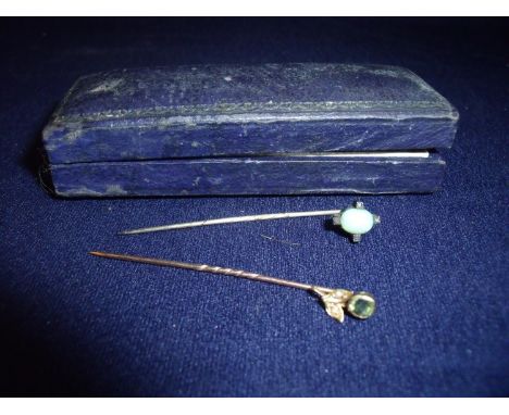 Two stick pins, one set with opal the other 15ct gold set with seed pearls and Citrine type stone in the form of a flower (2)