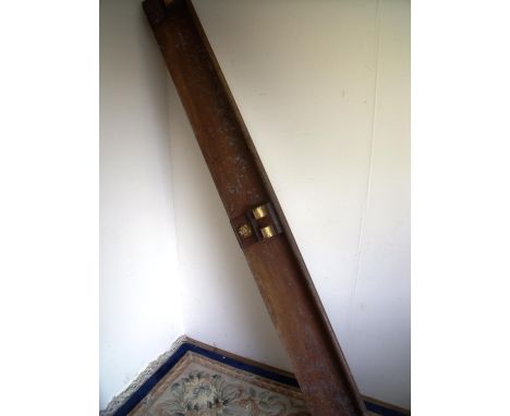 Large oak and gilt painted cornice/shelf pediment, with three corbel supports with gilt highlights and central carved figure 