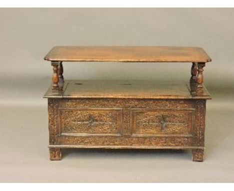 An early 20th century oak monk's bench, 107cm wide