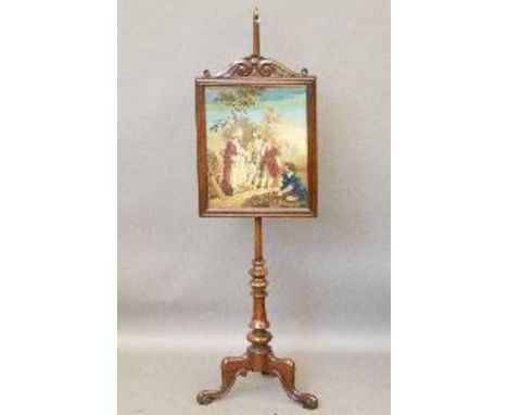 A Victorian mahogany pole screen, with embroidered panel on a tripod stand, 144cm high