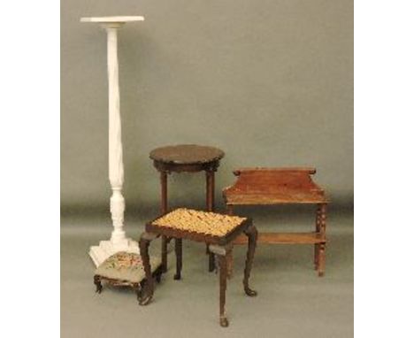 A mahogany table and stool, a cane seated stool, an open wall shelf, and a painted torchère