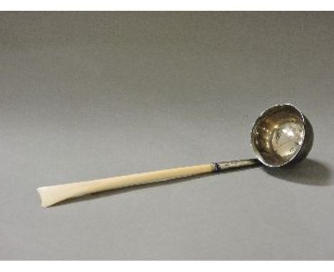 A George III silver toddy ladle, on an ivory handle, 15.5cm long