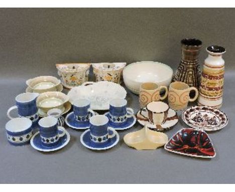 A quantity of early/mid 20th century Grays pottery mugs and bowls, Poole pottery, a Charlotte Rhead dish, and a quantity of R