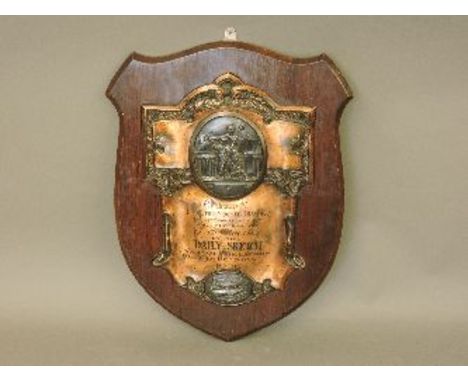 A cast metal plaque, 'Awarded to The Secondary School, Chippenham, in the Daily Sketch National Scholarship Competition 1926'