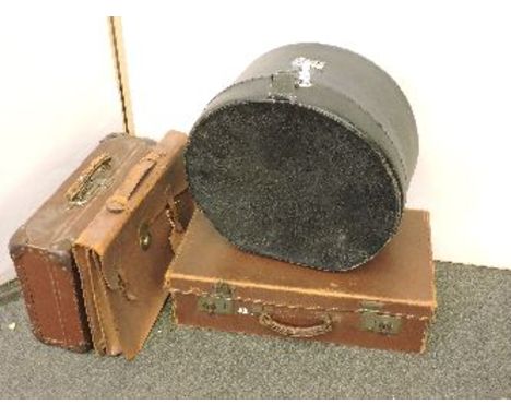 Various items, including suitcases, pressed flowers in three books, Christmas decorations, playing cards, etc