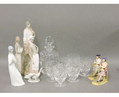 Lladro, Nao and other Spanish figures, a pair of 19th century Scotsman book rests, a cut glass decanter, and six whisky glass