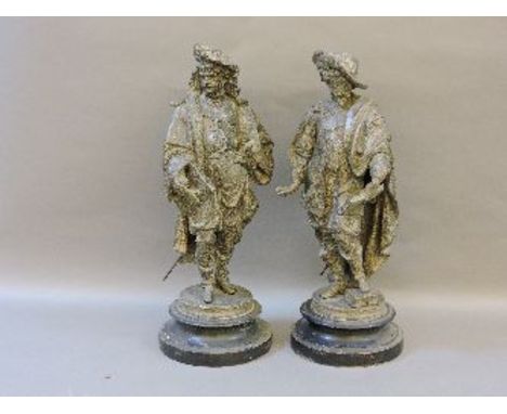 A pair of Victorian spelter figures of men, 55cm high, and an apothecary box with bottle and scales