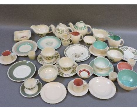 A Susie Cooper 'Everlasting Life' part teaset, with kestrel shape teapot, and other Susie Cooper tea wares, including a teapo