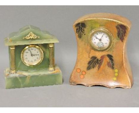 An Art Nouveau pottery clock, impressed Don Wilton, England,19cm high and a small onyx mantel clock, 16cm high