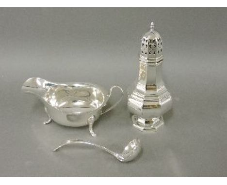 A sugar shaker, a sauce boat, and a ladle