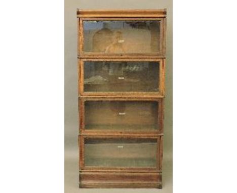 A Globe Wernicke four tier bookcase, labelled, 87cm wide, 184cm high