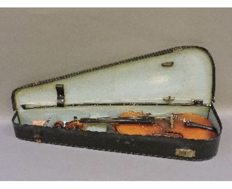 A German violin, circa 1900, with two piece back and interior label 'Antonius Stradivarius Cremonensis Faciebat Anno 1716'