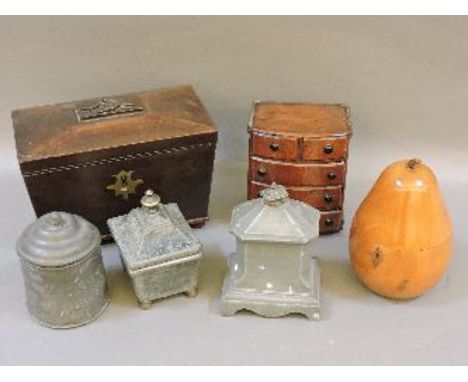 A pear tea caddy, miniature chest, two lead tea caddies, and another tea caddy