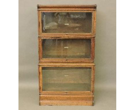 A Globe Wernicke three tier bookcase, labelled, 87cm wide, 155cm high