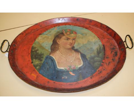 A two handled toleware tray with decorated with a portrait of a lady, oval